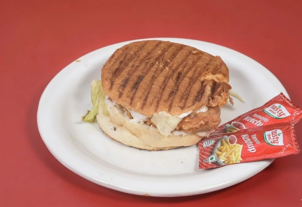 Chicken Cheese Grilled Burger at Biryani Box Company